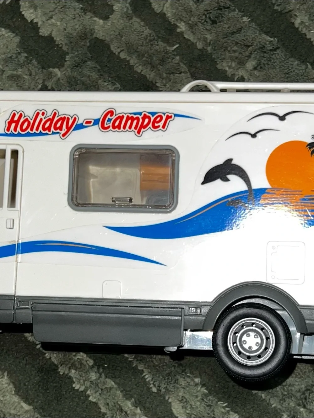 White Toy RV Bus with Palm Decal